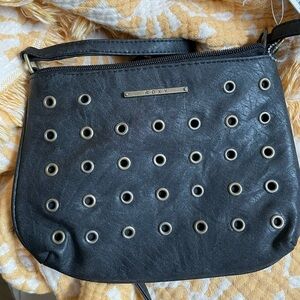 Black Roxy Leather side bag with gold studs.